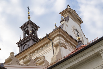 Fototapeta na wymiar Crosses on the roof of a Catholic cathedral