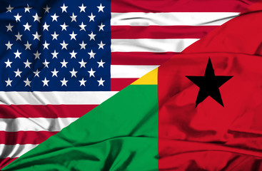 Waving flag of Guinea Bissau and USA