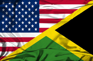 Waving flag of Jamaica and USA - 65483753