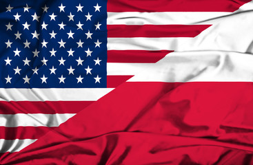Obraz premium Macha flagą Polski i USA
