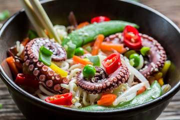 Fresh vegetables with octopus and noodles