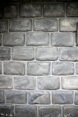 Old stone of dark wall.