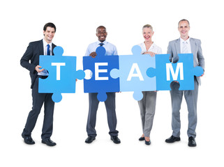 Business People Holding Team Sign