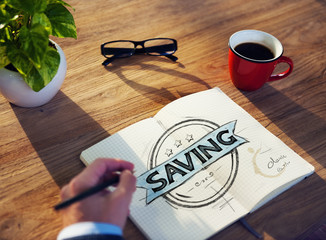 Businessman's table with Saving Concept