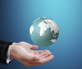 holding a glowing earth globe in his hands 