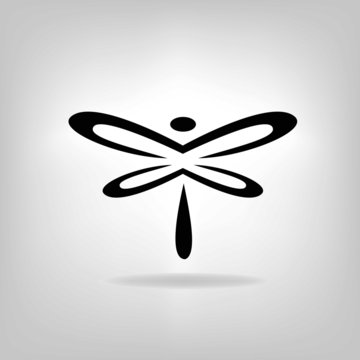 the stylized silhouette of a dragonfly on a light background