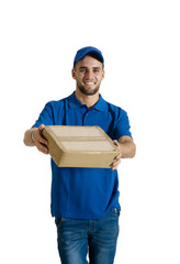 Young handsome delivery guy with boxed parcels