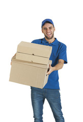 Young handsome delivery guy with boxed parcels
