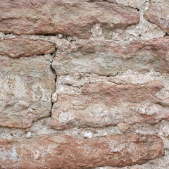 Old brick castle's wall fragment