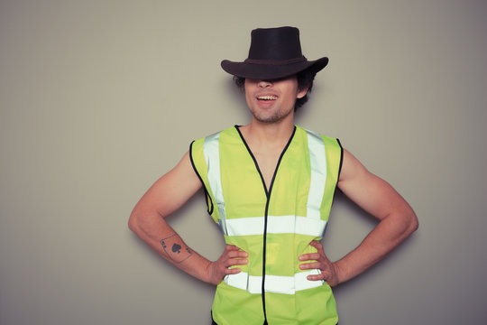 Cowboy Builder Wearing A High Visibility Vest