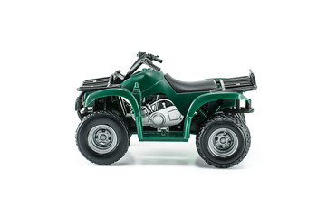 Green ATV toy isolated on white