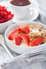 healthy breakfast with granola and strawberry