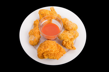 Fried Chicken with Pepper Sauce on White Plate