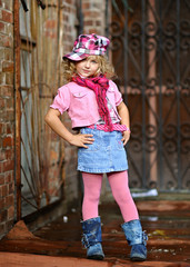 portrait of little girl outdoors in summer
