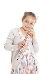 young  girl holding flute © ahavelaar