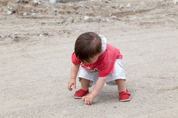Close-up of a boy playing in street