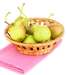 ripe pears in basket isolated on white.