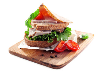 Delicious sandwiches with meet isolated on white