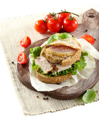 Delicious sandwiches with meet isolated on white