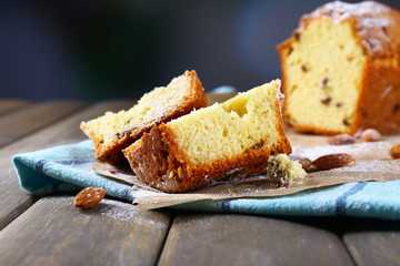 Tasty cake on table on dark background