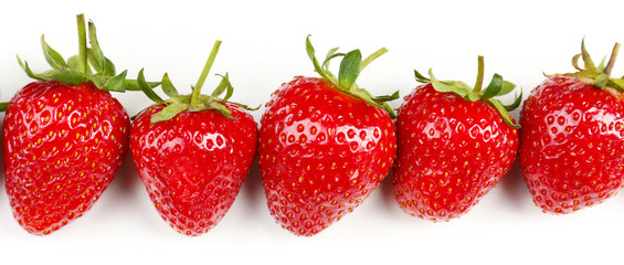 Obraz na płótnie Canvas Red ripe strawberries, isolated on white
