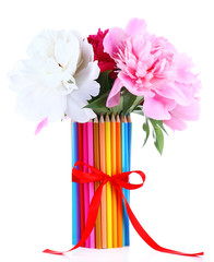 Beautiful flowers in colorful pencils vase isolated on white
