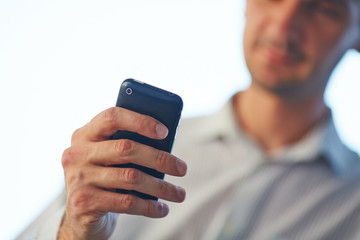 man using mobile phone