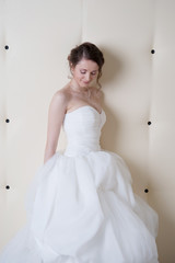 Fototapeta premium smiling bride in white dress