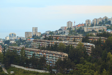 Obraz premium Buildings on mountain with windows lights