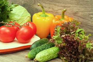 mixed vegetables on a wooden background