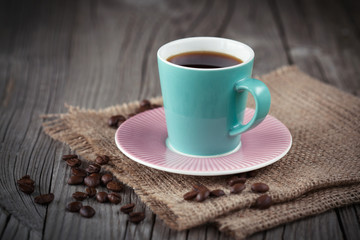 Cup of espresso on a wooden table