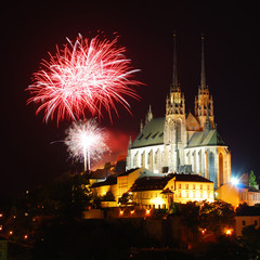 Gothic medieval cathedral with fireworks above