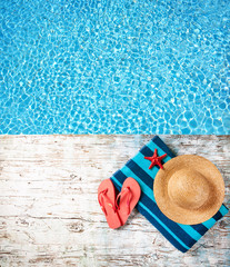 Summer accessories on wooden planks