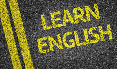 Learn English written on the road