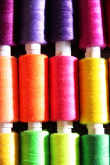 Multicolor sewing threads background