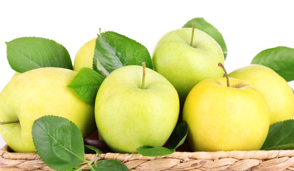 Ripe sweet apples with leaves, isolated on white