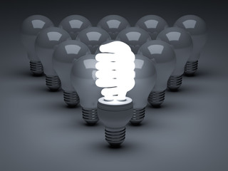 Leadership concept glowing Eco energy saving light bulb leads