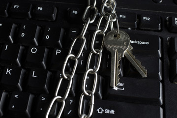 Black keyboard with chain and keys