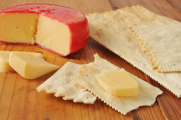 Fototapeta na wymiar Gouda cheese on flatbread crackers
