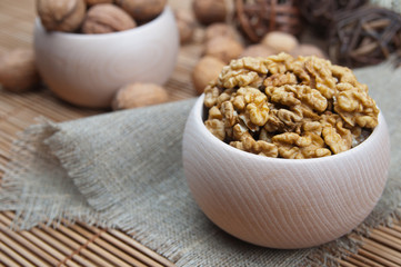 Walnuts in wooden bowls