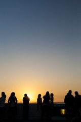 Fototapeta na wymiar People Contemplating Sunset and Enjoying it in Los Angeles, Cali