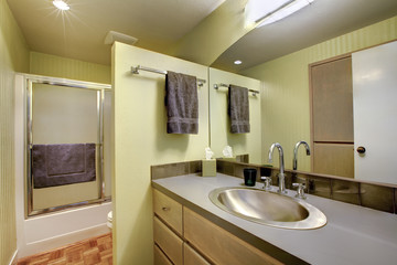 Bright bathroom with glass door shower
