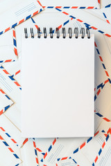Fototapeta premium notebook on a envelope background