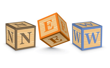 Word NEW written with alphabet blocks