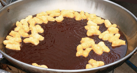 Deep-fried dough stick on the pan