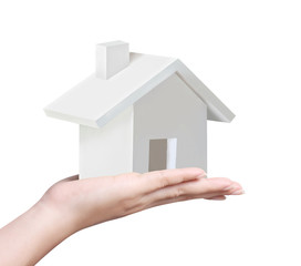holding house representing home ownership