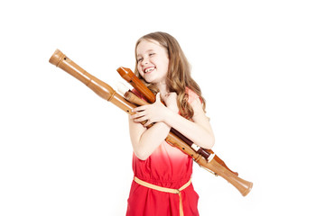 young girl with recorders