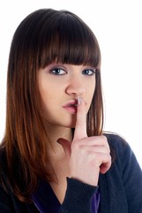 Naklejka premium Woman gesturing to silence