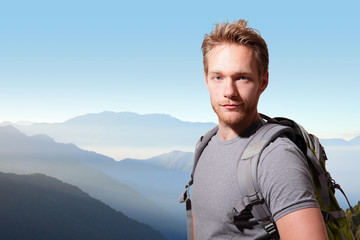 Naklejka premium Successful man mountain hiker