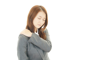 肩痛を訴える女性
